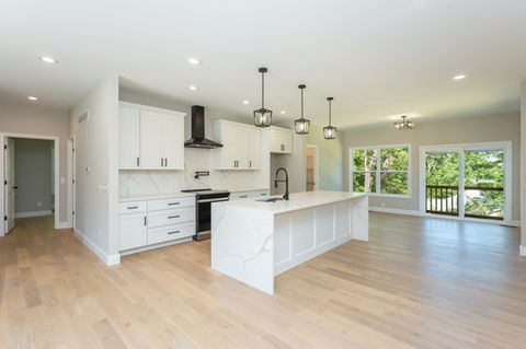2840 Accomac modern kitchen with white cabinets, island
