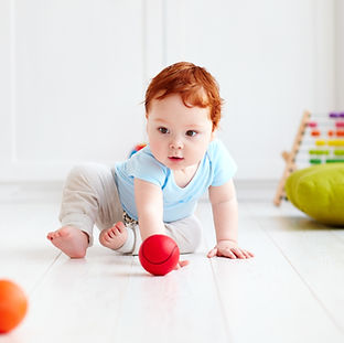 Baby Playing Indoors