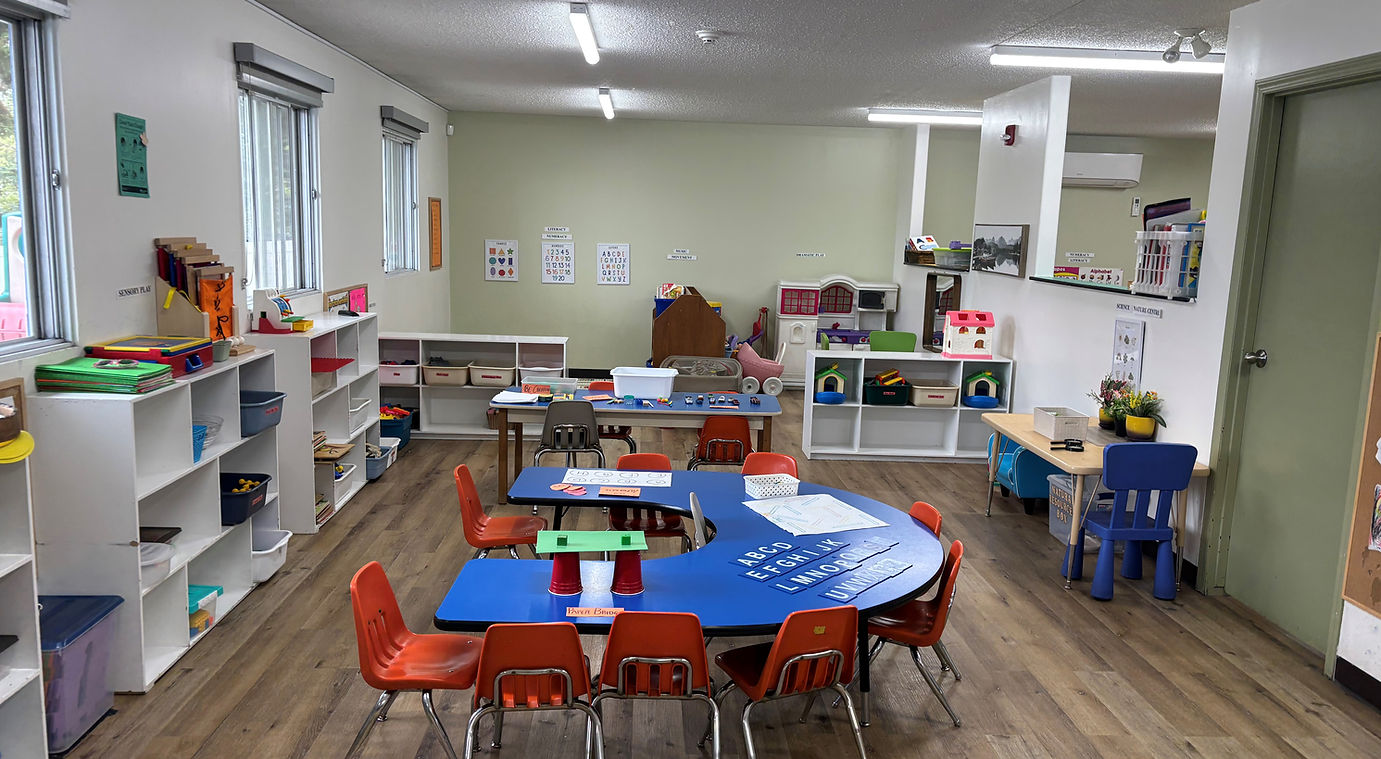 A classroom setup with multiple tables