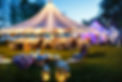Colorful wedding tents at night