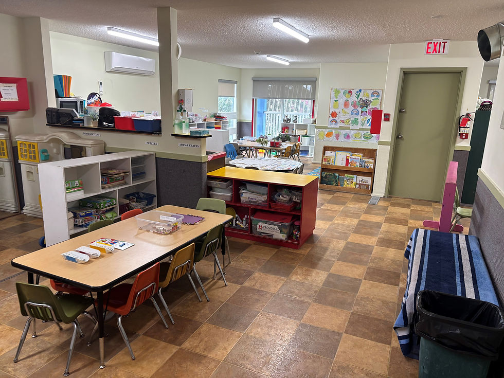 A school classroom featuring rows of tables and chairs arranged