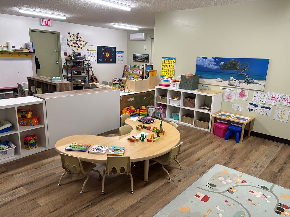 A colorful playroom filled with various toys and furniture