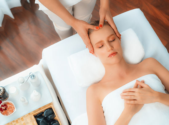 Panorama top view of woman enjoying relaxing anti-stress head massage and pampering facial beauty skin recreation leisure in dayspa modern light ambient at luxury resort or hotel spa salon.