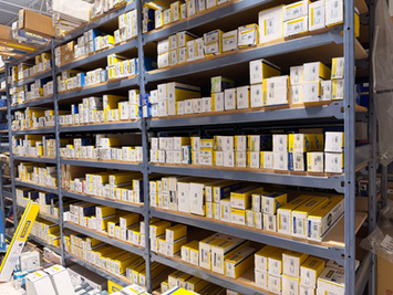 Storage racks filled with labeled automotive replacement parts and supplies
