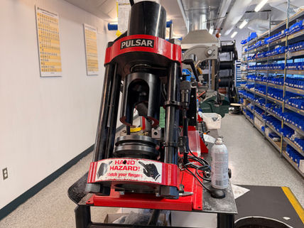 Professional coolant exchange machine displayed inside Veg Auto service department