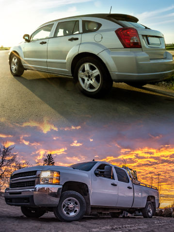 A white pickup truck is parked car on the concrete parking