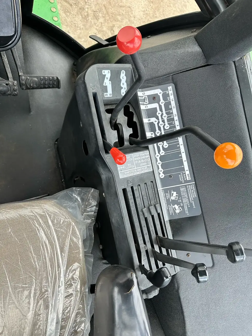 Controls of  a JOHN DEERE 4440 TRACTOR