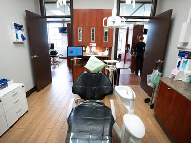 Modern dental treatment room with chair