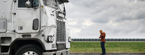 broken truck after the accident in foreground