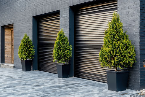 Modern Exterior Design with Green Plants and Rolling Shutters for Contemporary Architecture 