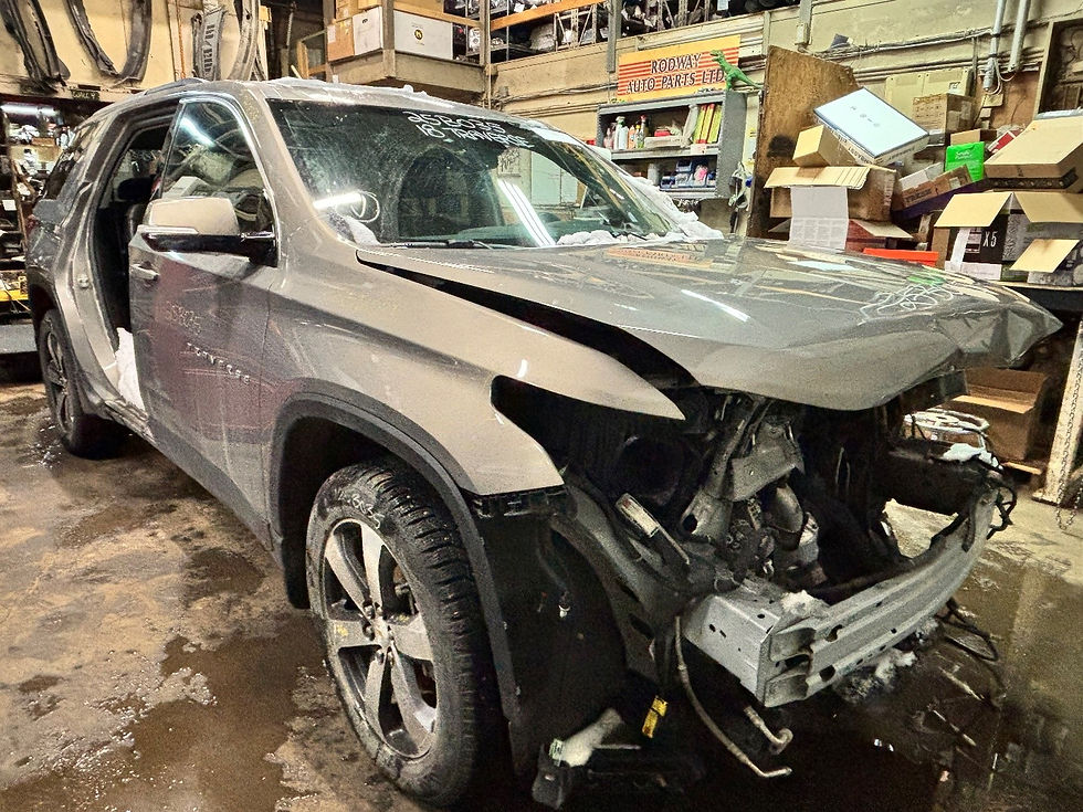 Front right view of a 2016 TRAVERSE LT AWD 3.6L 94K