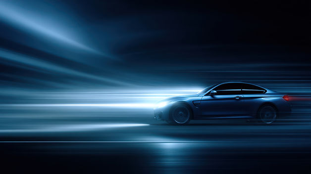 A car is moving in left direction.