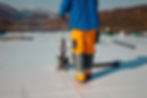 A roofer applies a membrane to a flat roof