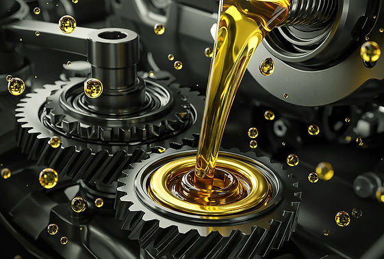 Golden Lubricant Oil Dripping on Mechanical Gears and Cogs