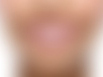 Woman smiling with pearly white teeth