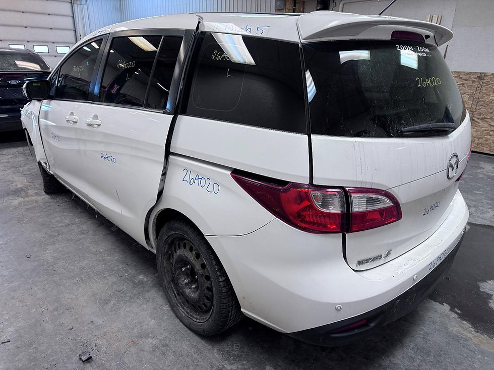 Back left view of a 2013 MAZDA 5 2.5L 187K