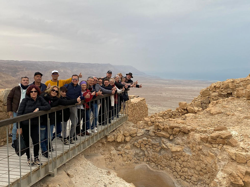 A group enjoying a tour at Masada.