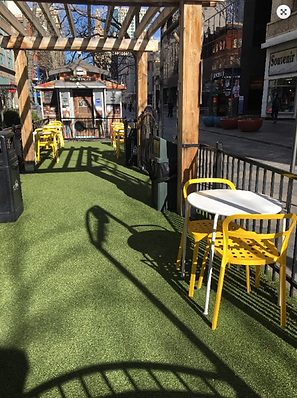 Clean public use area with tables and chairs
