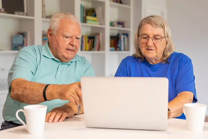Man and woman on their laptop