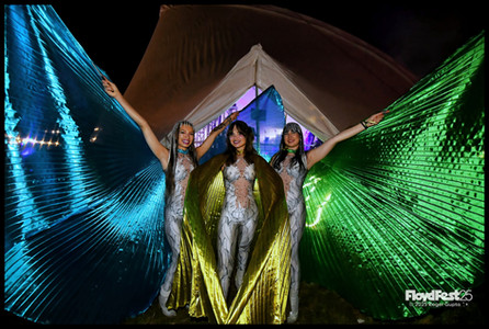 3 Performers with Blue, Gold, Green Wings