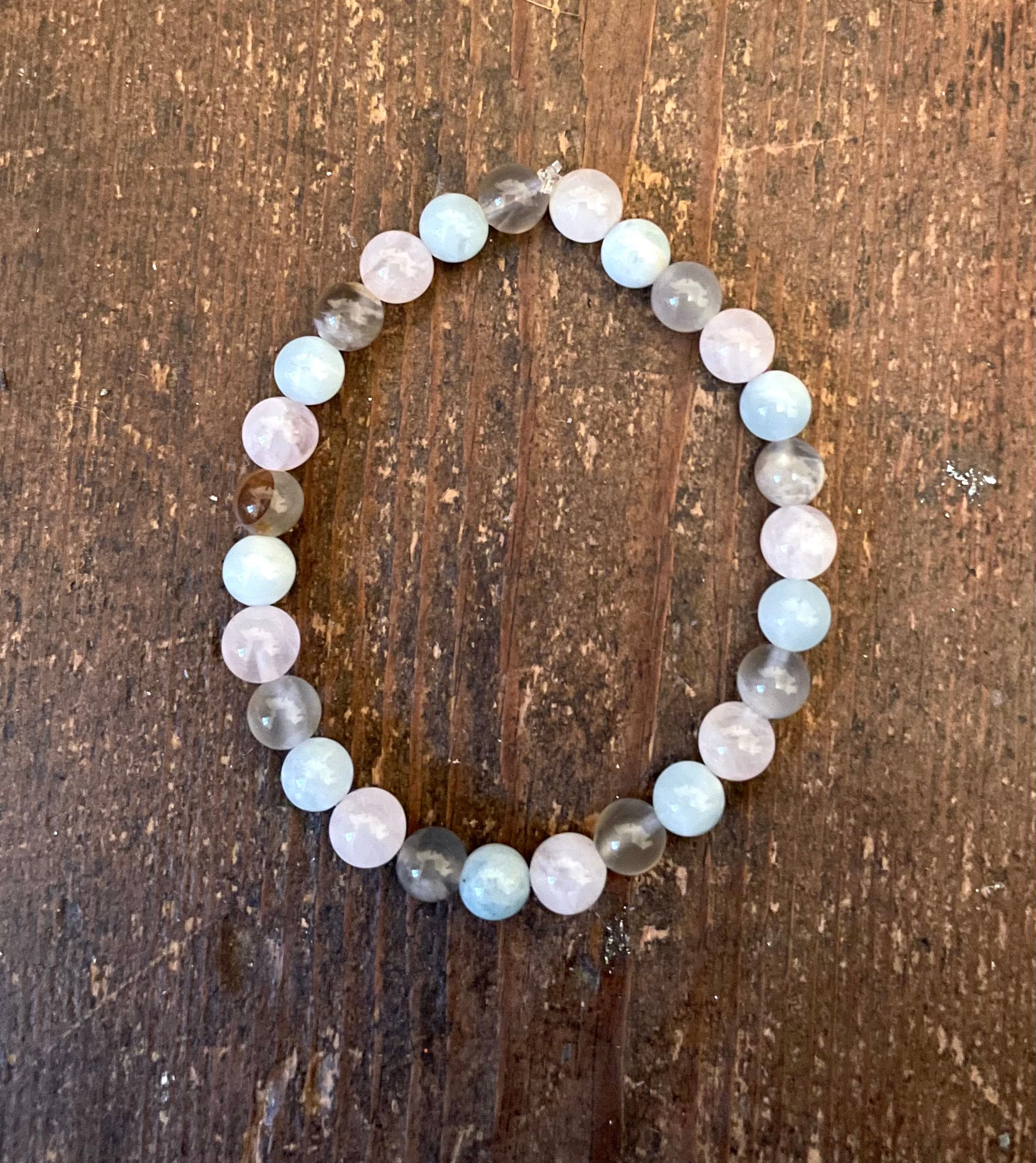 Bracelet with pale pink, aqua colour and light grey beads