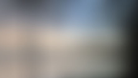 mist descending over a lake at sunrise