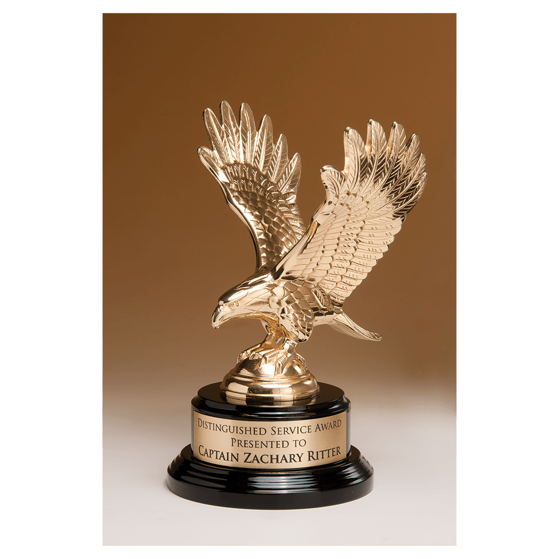 9" Fully Modeled Gold Finish Metal Eagle on a Black Piano Finish Base with a Gol