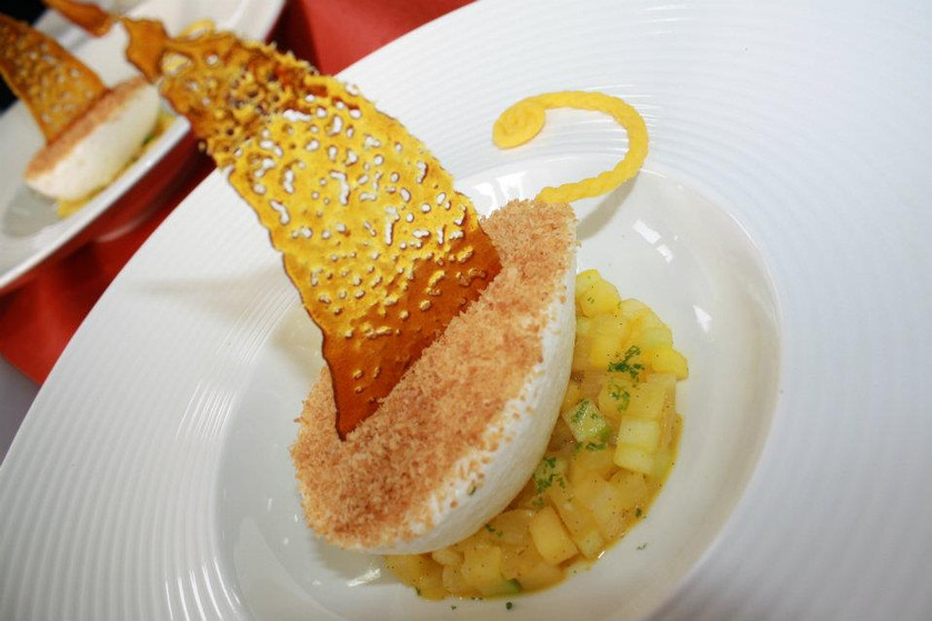Flotting island, Regatta version coconut ice cream, on a sea of Mango and Citronella Dessert by L'Annexe French restaurant.jpg