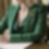 blonde woman in a green jacket writing in a formal cotswold restaurant_edited.jpg
