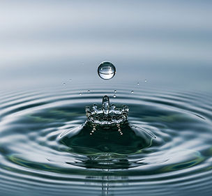 Single Drop of Water Causing Ripples