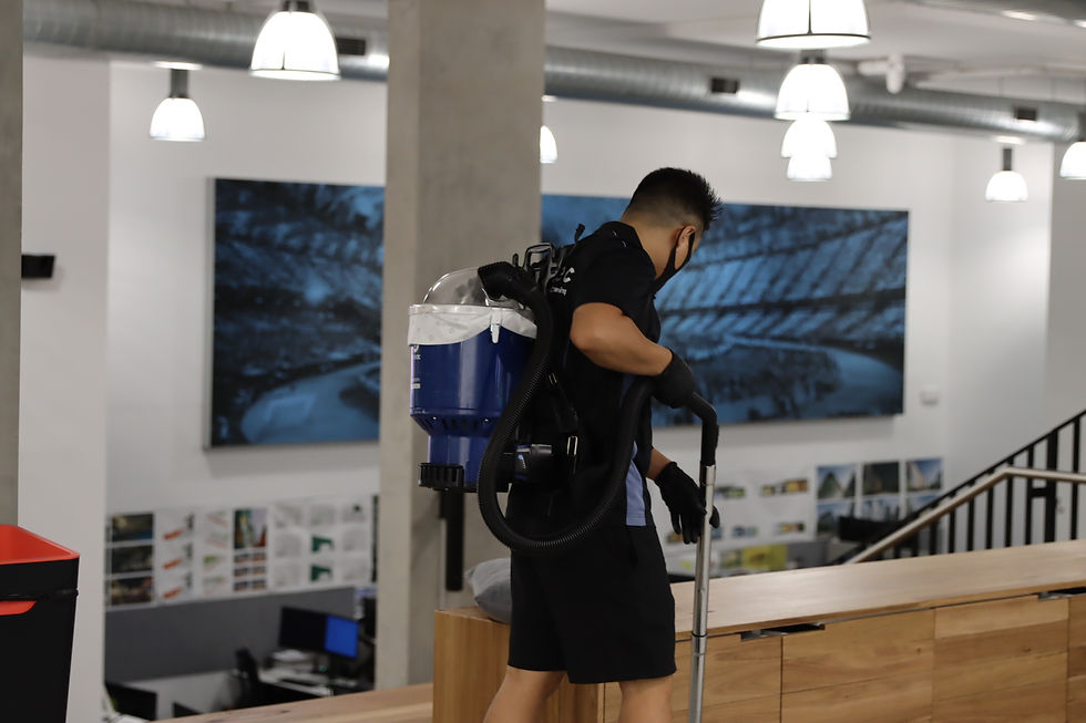 Cleaner vacuuming office