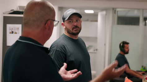 Paul talking to a client