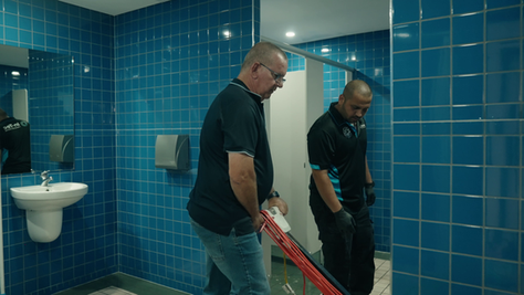 Paul showing In-Tec cleaner to scrub floors