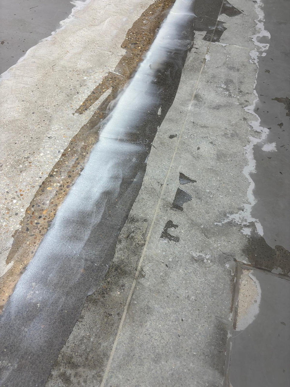 Really big crack that has been filled and ground down