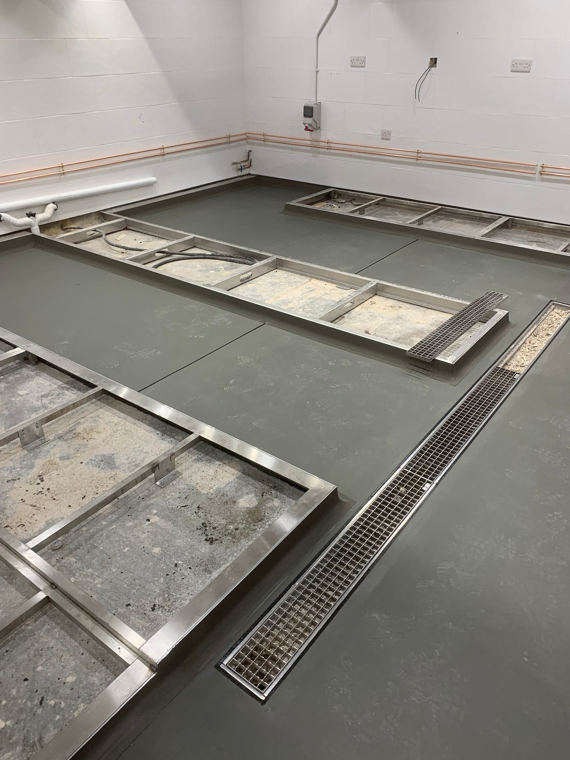 Grid system on a resin covered floor