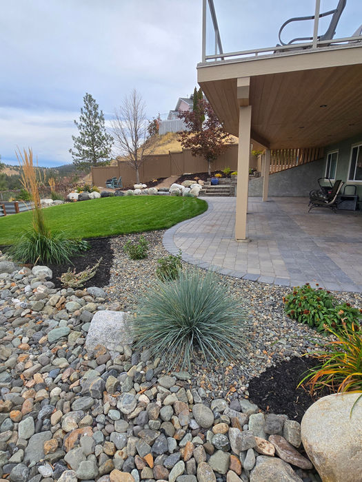Minimalist line icon for softscaping and garden design featuring a growing plant with leaves.