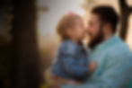 father-hugging-child-golden-hour-portrait.jpg