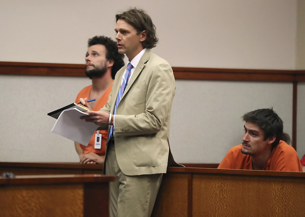 In this Wednesday, May 31, 2017 court-appointed "lawyer of the day" Merritt Hemingway defends a person charged with a crime at Cumberland County Superior Court in Portland, Maine.