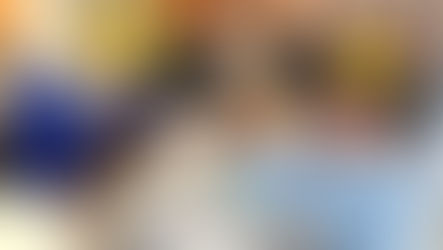 Colorado Credit Union mascot, Cash the eagle, serving breakfast to kid