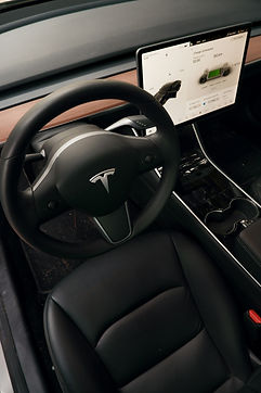 Clean Black Tesla Interior Driver.jpg