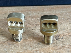 Piano stringing studs - one repaired and one original