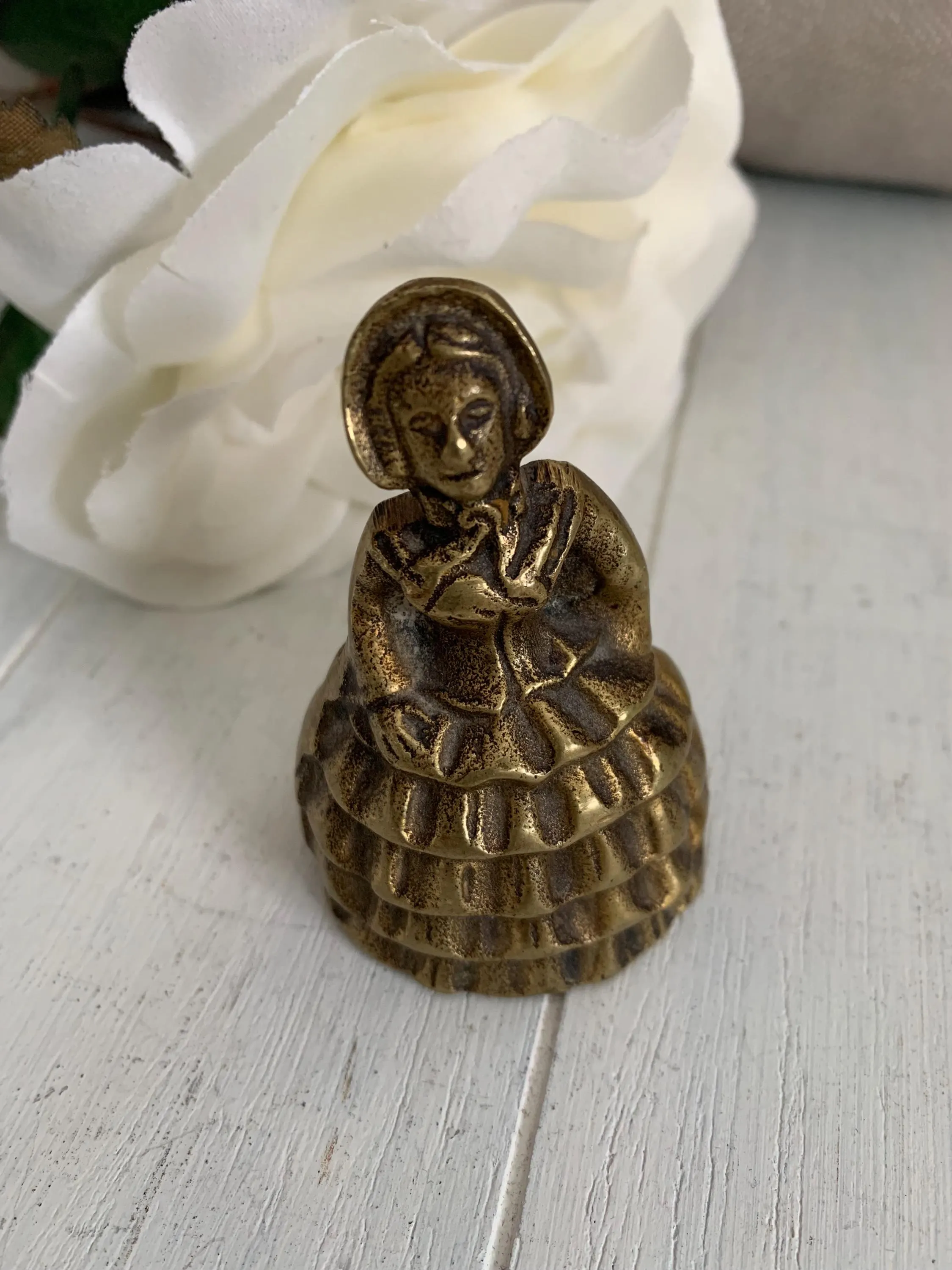 Vintage solid brass lady bell