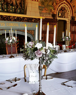 Silver candelabra wedding centrepiece hire Cardiff Castle venue styling