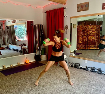 Dawni Rae leading a virtual Zoom fitness workout from her home studio