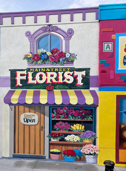 Colorful mural of a florist shop with flowers.