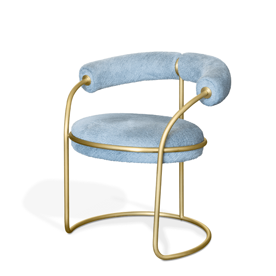 Chaise en tissu doux et laiton doré