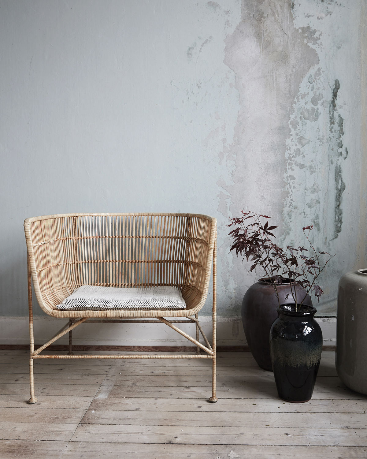 Fauteuil en rotin et fer naturel