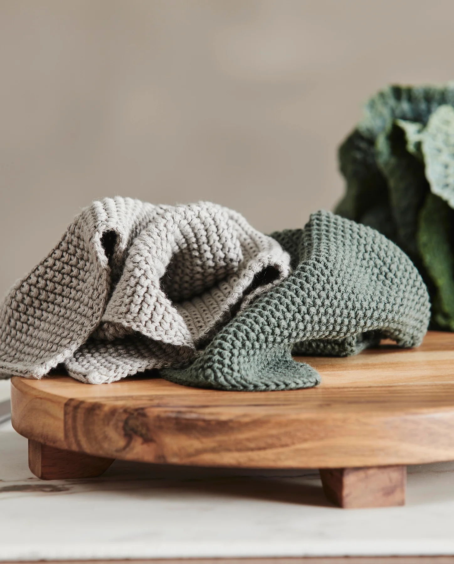 Lot de 2 maniques en tricot vert foncé