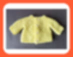 A doll's cardigan knitted in garter stitch