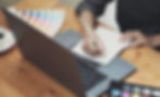 vecteezy_young-asian-female-designer-using-graphics-tablet-while_8142362.jpg